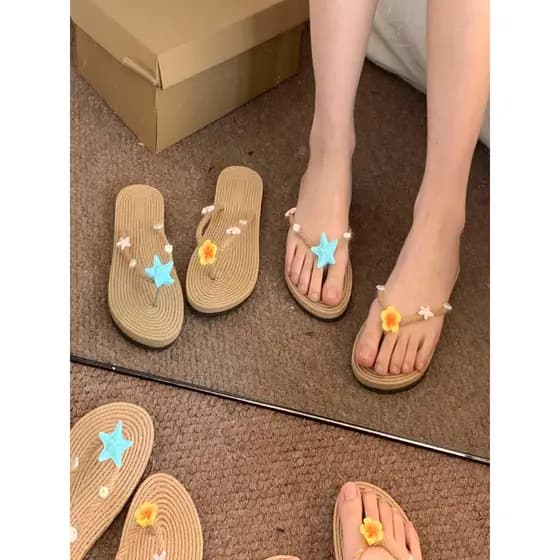 Xiaohongshu mesmo estilo Flip-Flops verão beira-mar férias estilo estrela do mar palha sapatos de praia plana antiderrap