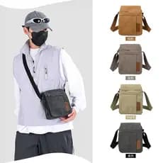Amazon bolsa de ombro masculina de venda quente 2026 novo estilo Casual Commuter mochila bolsa de lona moda Cross-body b