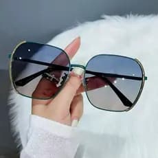 Óculos de sol senhoras na moda rosto redondo óculos de sol verão 2025 novo estilo rua tiro Anti-ultravioleta influenciad