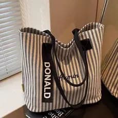 Bolsa de lona listrada de grande capacidade feminina 2026 novo estilo moda portátil bolsa de compras de um ombro Casual