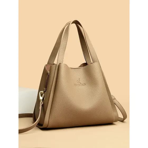 Bolsa feminina de couro genuíno versão coreana bolsa de couro macio feminino 2026 novo estilo moda senhoras de meia-idad