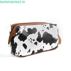 2026 Bolsa cosmética com padrão de vaca de grande capacidade de alto valor Embreagem Retro Fashion Nicho Fashion