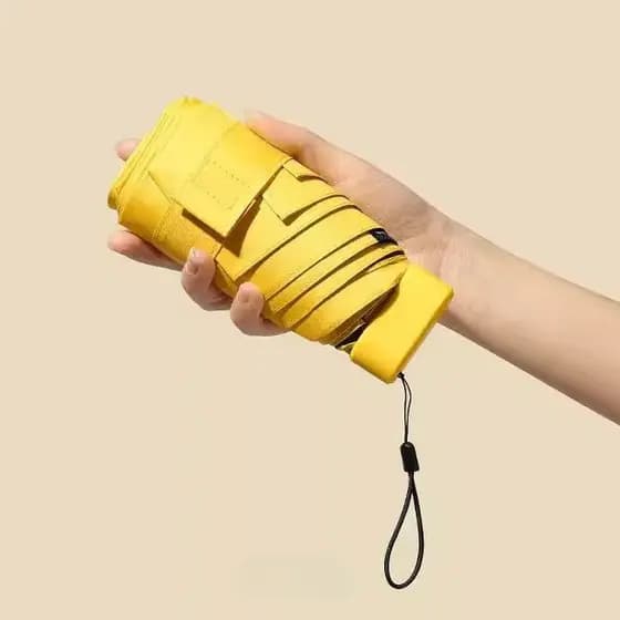 Guarda-sol pequeno portátil ensolarado chuva Ultra-leve guarda-sol feminino cápsula guarda-chuva Mini bolso guarda-chuva