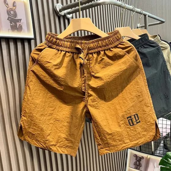American Street Wear Shorts casuais masculinos moda verão All-Match calças de praia soltas calças esportivas respiráveis