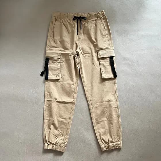Primavera outono Metes textura calças casuais masculinas na moda Multi-bolso juventude All-Match pé-gravata macacão calç