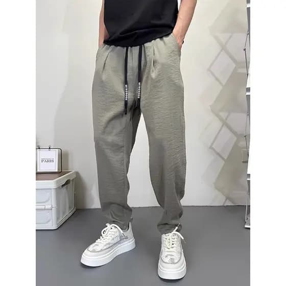Verão masculino linho fino calças casuais soltas em linha reta gelo seda legal calças de perna larga rufião bonito Drape