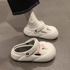 Buraco sapatos femininos de sola grossa exterior Wear 2026 verão novo estilo gatinho bonito Baotou sandálias femininas g