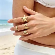 Conjunto de 4 anéis dourados em formato de estrela-do-mar com design vazado ajustáveis joias vintage femininas