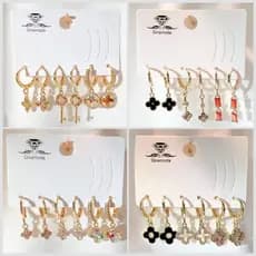Kit 3 pares de brincos Argolas Cravejadas Pedra de Zirconia pingente trevo e chave Folheados a Ouro18k e Prata 925