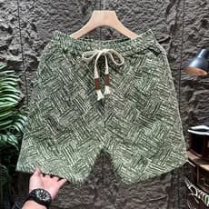 2026 Street Wear Calças Cortadas Homens Verão High-End Criativo Jacquard Shorts Soltos Praia Calças Casuais Calças Média