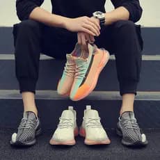 Moda juventude novo estilo das mulheres dos homens na moda malha respirável esportes tênis de corrida voando sapatos de