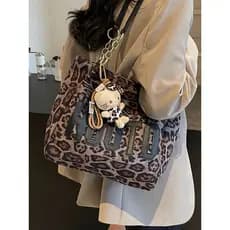 Camurça grande capacidade leopardo impressão saco feminino 2025 novo estilo moda versão coreana de um ombro Commuter sac