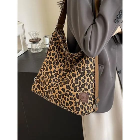 Bolsa de lona com estampa de leopardo feminina 2025 novo estilo Casual mochila de grande capacidade All-Match classe um