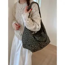 Nicho leopardo impressão bolsa de lona feminina 2025 novo estilo moda um ombro Commuter saco grande capacidade All-Match