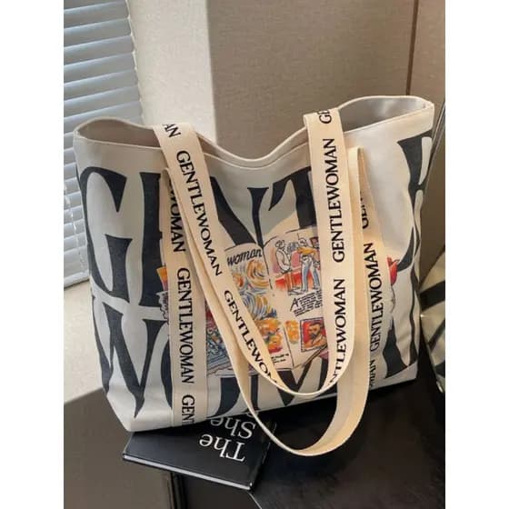 Graffiti carta bolsa de lona feminina 2025 novo estilo moda Casual grande capacidade bolsa de ombro estudante classe sac