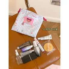 Bolso com cordão Mini saco cosmético feminino 2025 novo portátil pequeno armazenamento Outing batom portátil bolsa de ar