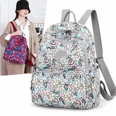 Novo estilo de náilon pano mochila feminina moda impressa pequena mochila feminina saco Oxford pano mochila viagem mãe