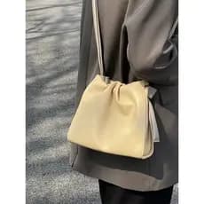 Verão novo estilo amarelo saco feminino 2026 novo estilo nicho moda contraste cor de um ombro cruz-corpo nuvem saco bald