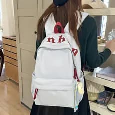 Nova mochila escolar leve com estampa de letras para estudantes do ensino fundamental, elegante e atraente, no mesmo est