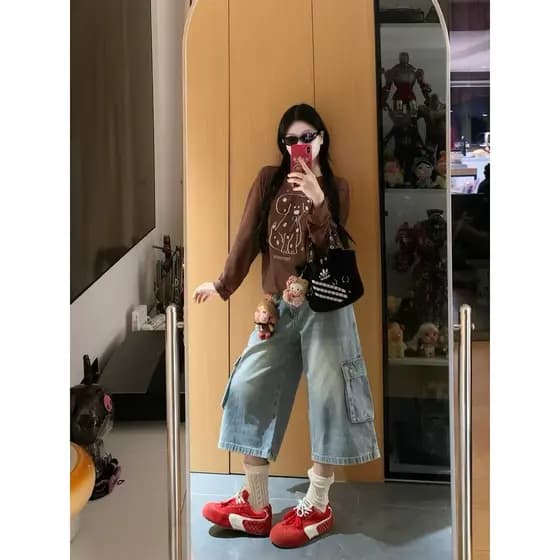 Macacão retrô azul claro cortado Jeans cintura alta solto com vários bolsos calças médias de perna larga