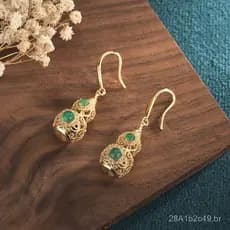 Blogger do Xiaohongshu recomenda brincos vintage de calcedônia em formato de cabaça, de estilo étnico, banhados a ouro a