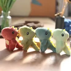 Brinquedo de Pelúcia Dinossauro Fofinho Pendurado Ano do Dragão Boneca de Pelúcia Macia Chaveiro Mochila Bolsa Anel de C