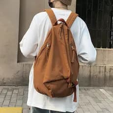 Mochila masculina de lona lavada japonesa coreana nicho mochila cor sólida Retro High-End sentimento grande capacidade e