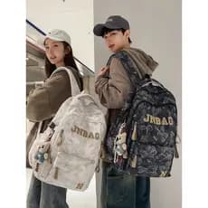 2026 novo estilo pequeno urso mochila feminina estudantes universitários reduzir carga Ridge proteção júnior estudantes