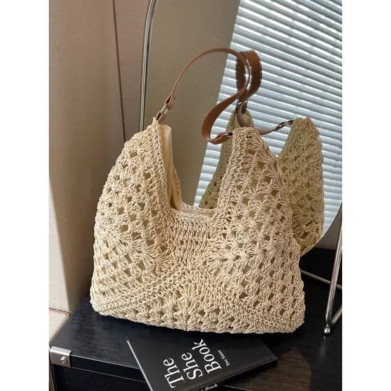 Influenciador bolsa de palha francesa feminina 2026 novo estilo sensação solta férias à beira-mar bolsa de tecido Casual