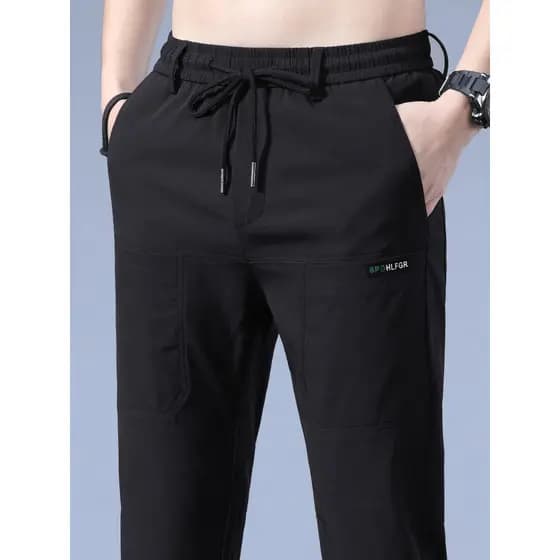 Outono esportes calças casuais masculinas soltas cintura apertada cordão rendas em linha reta elástica calças masculinas