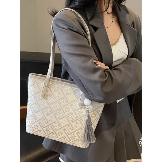 Novo estilo chinês geométrico impresso sacola feminina High-End sentir grande capacidade All-Match bolsa de ombro borla