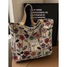 Bolsa de lona feminina 2025 novo estilo sacola grande capacidade trabalho Commuter sacola nicho Design mamãe saco