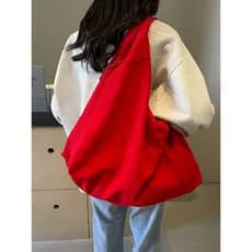 Bolsa de lona vermelha feminina de grande capacidade Commuter All-Match 2026 novo estilo viagem preguiçoso sensação solt
