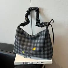 Estilo coreano ins xadrez bolsa de ombro feminina 2025 deste ano Popular venda quente grande capacidade Commuter All-mat