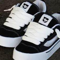tenis marts kn skate preto branco casual Masculino e Feminino dia a dia