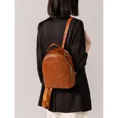 Genuíno couro genuíno pequena mochila feminina 2026 novo estilo luz luxo nicho High-End mochila viagem leve Retro primei