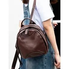Couro genuíno pequena mochila feminina 2026 novo estilo moda All-Match Commuter Casual senhoras mochila nicho High-End l