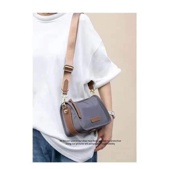 Bolsa mensageiro feminina bolsa de lona bolsa casual pequena novo estilo pequena bolsa de ombro casual sela luz