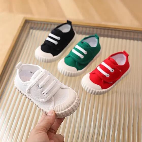 Sapatos internos de jardim de infância primavera outono 2025 novo estilo bebê sapatos de lona de sola macia meninas meni