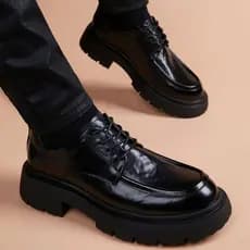 Hangzhou Feixiang Sapatos masculinos Boshio Sapatos de couro masculino 2025 Novo estilo de sola grossa com aumento de al