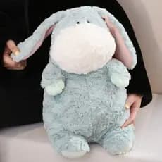 O adorável e divertido boneco de pelúcia de burro da Popova, um pequeno burro de desenho animado que acalma, macio e ado