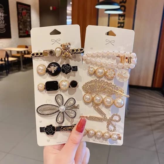 Novo clip de cabelo em forma de pena de perla com rinocerontes para batimentos de mulheres