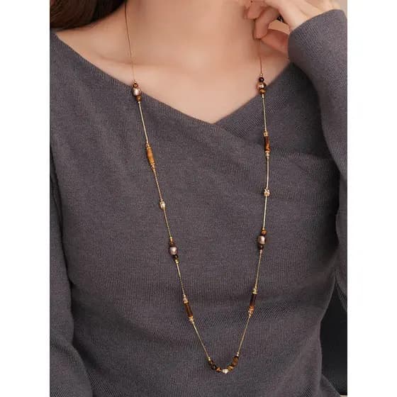 Empilhado longo olho de tigre colar 2026 novo estilo luz luxo nicho High-End camisola corrente primavera verão Retro ace