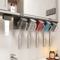 2026 Novo produto Espelho Armário Rack de escova de dentes sem perfuração Vaso sanitário de cabeça para baixo Copo de en