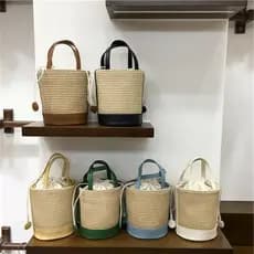 bolsa femenina Bolsa Bolsa feminina 2025 novo estilo High-End férias palha tecido saco cilindro portátil Cross-corpo bal