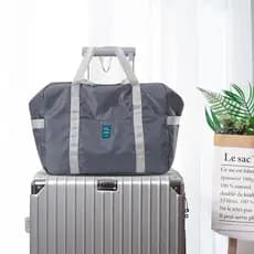 Saco de viagem grande capacidade feminino viagem de negócios ferramenta útil dobrável saco de bagagem de mão pode cobrir