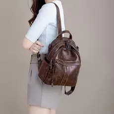 Mochila feminina 2026 novo estilo moda Casual senhoras saco pequeno couro genuíno grande capacidade mochila de viagem co