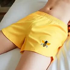 Calças soltas respiráveis de seta masculinas Little Bee Calças de três pontos de algodão puro Calças jovens de 3 pontos