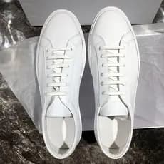 Sapatos brancos comuns feitos à mão masculinos versão coreana plana rendas All-Match tênis brancos homens casal sapatos