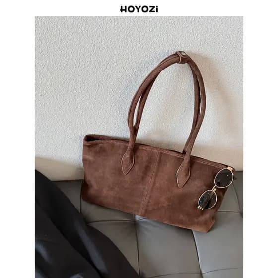 [Bolsa Xiaoyoujia] HOYOZI Bolsa de inverno de couro genuíno feminina 2026 Novo estilo Bolsa de ombro com sentido de alta